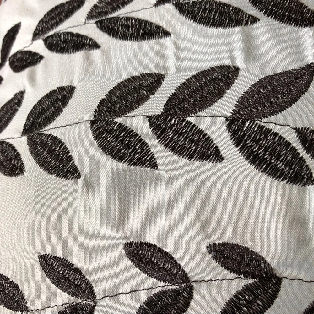 Teal leaf embroidered lumbar pillow